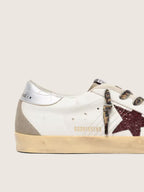 Superstar with burgundy glitter star and silver heel counter